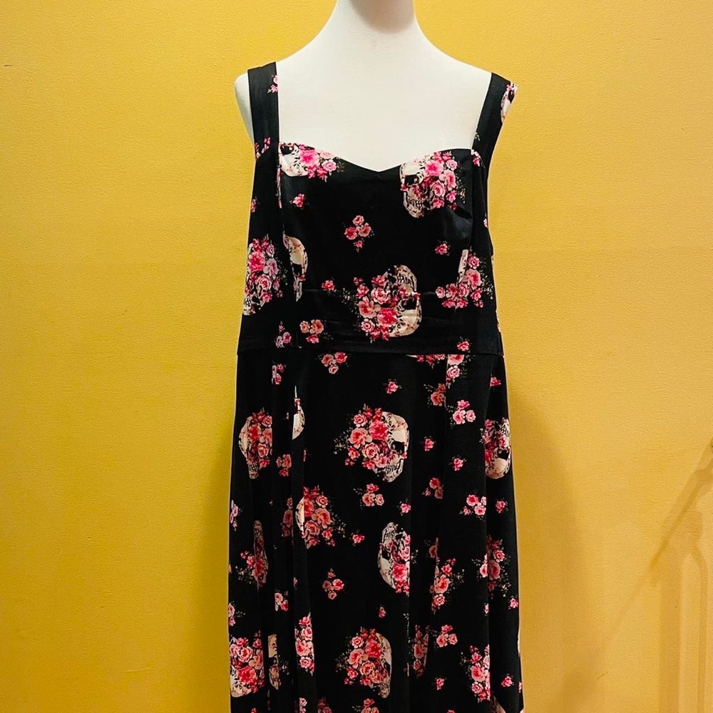 Skull and pink roses on black dress